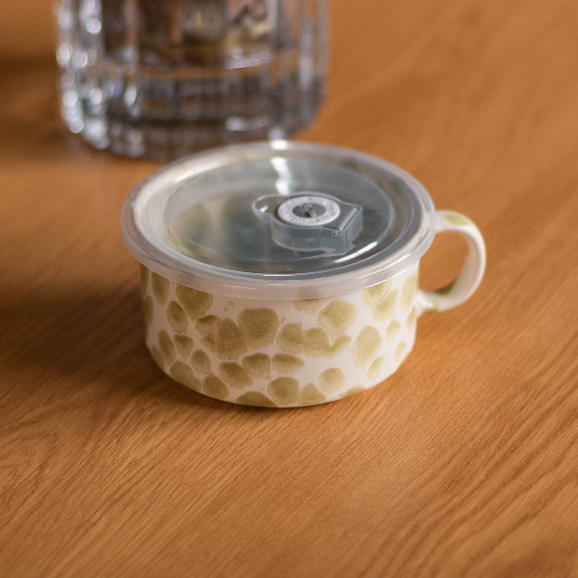Shop our olive speckled travel soup mug with fitted lid. Perfect for soup, noodles, leftovers and cosy lunches on the go.