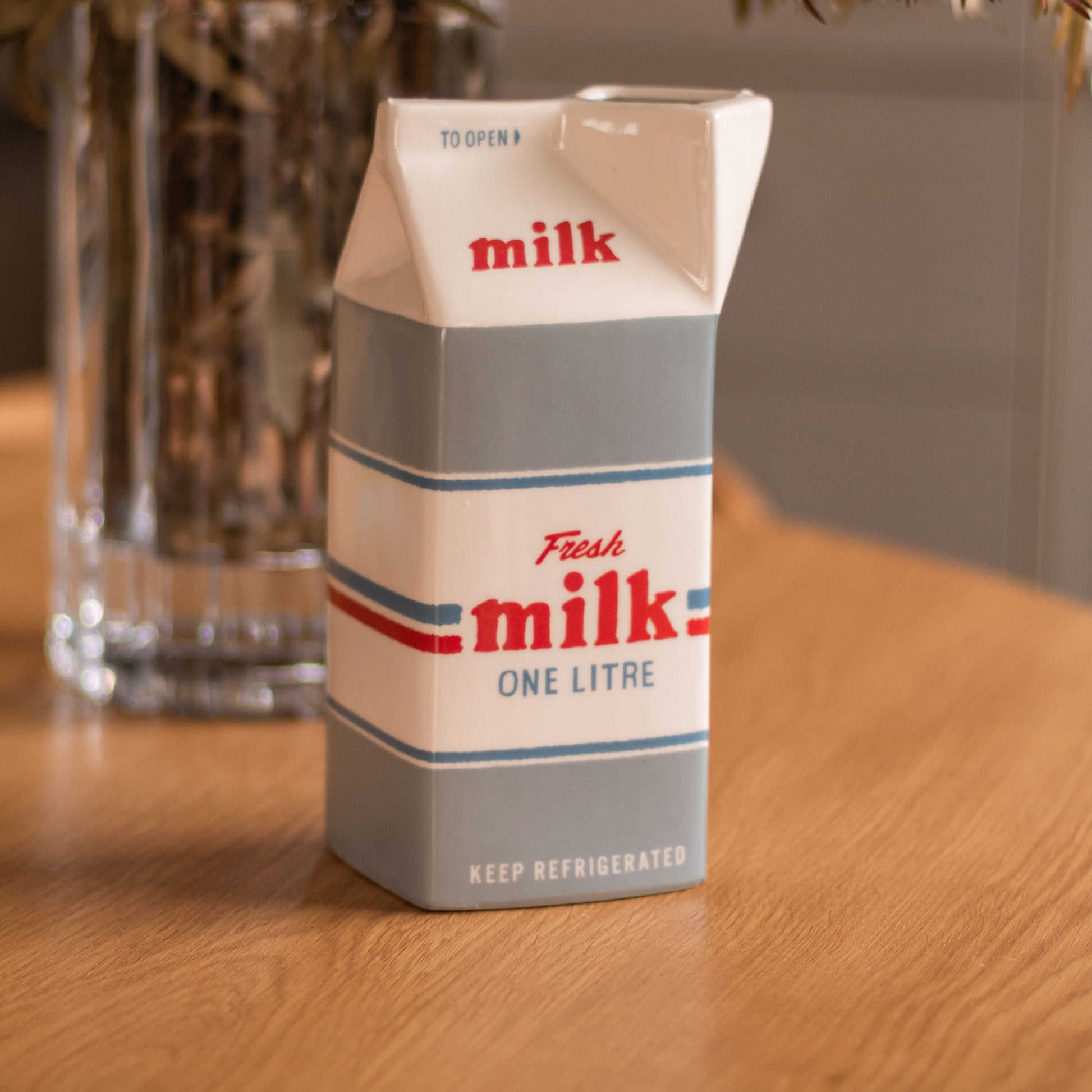Shop our retro milk bar ceramic jug, inspired by nostalgic Australian corner stores. Perfect as a milk jug, vase or playful kitchen decor.