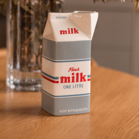 Shop our retro milk bar ceramic jug, inspired by nostalgic Australian corner stores. Perfect as a milk jug, vase or playful kitchen decor.